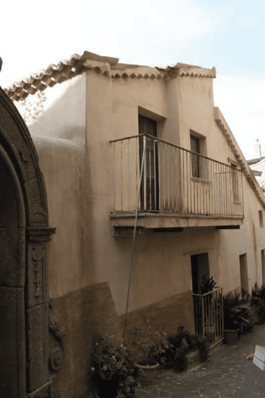 Walking through a Calabrian village looking at stone houses